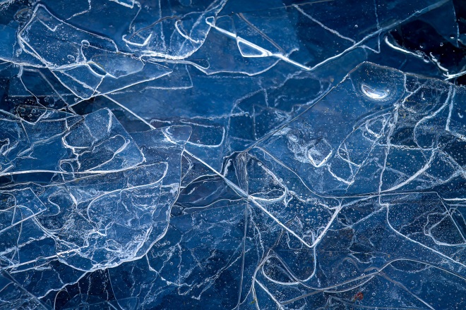 Thin sheets of broken ice mimic broken glass
