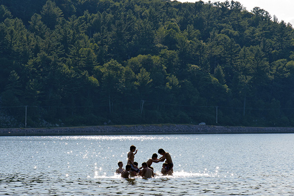 kids playing in the lake