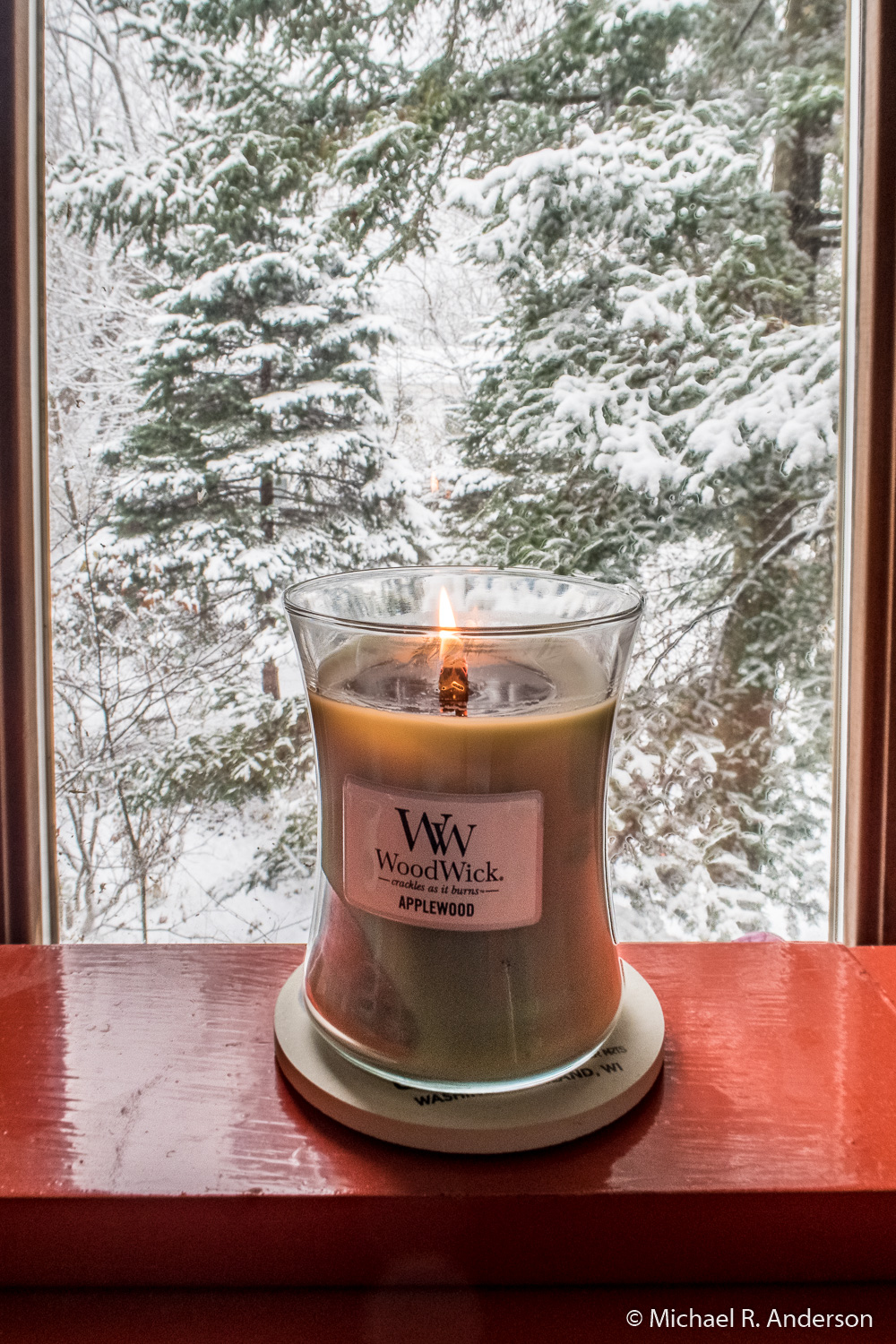 candle in front of window